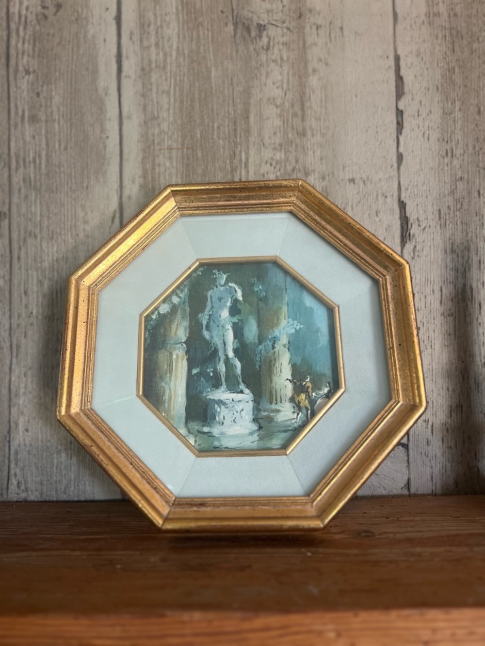 Octangular shadow box style gold framed Apollo wall art